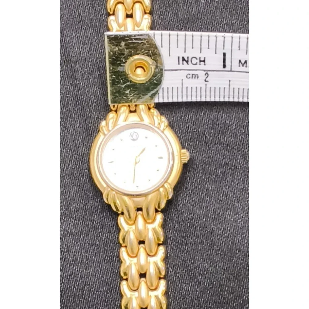 Caravelle by Bulova 44P07 women's Watch Gold Tone Round White Face #W5153